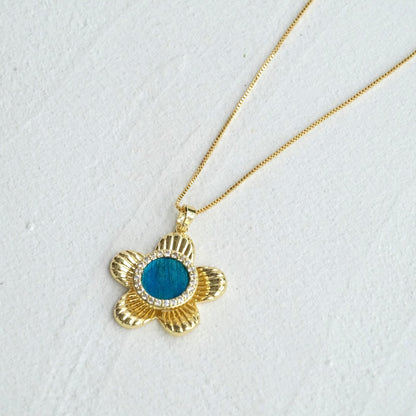Spinning Flower Necklace With Peacock Feather