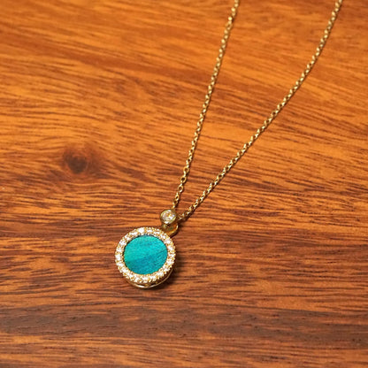 Round Spinning Necklace With  Peacock Feather
