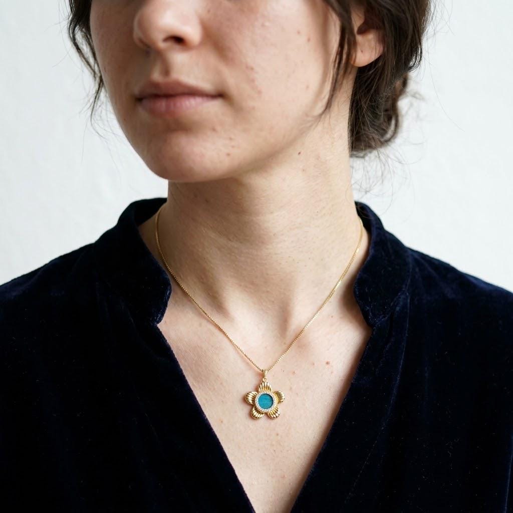 Spinning Flower Necklace With Peacock Feather