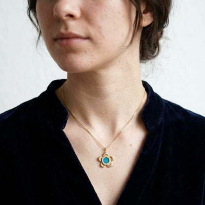 Spinning Flower Necklace With Peacock Feather
